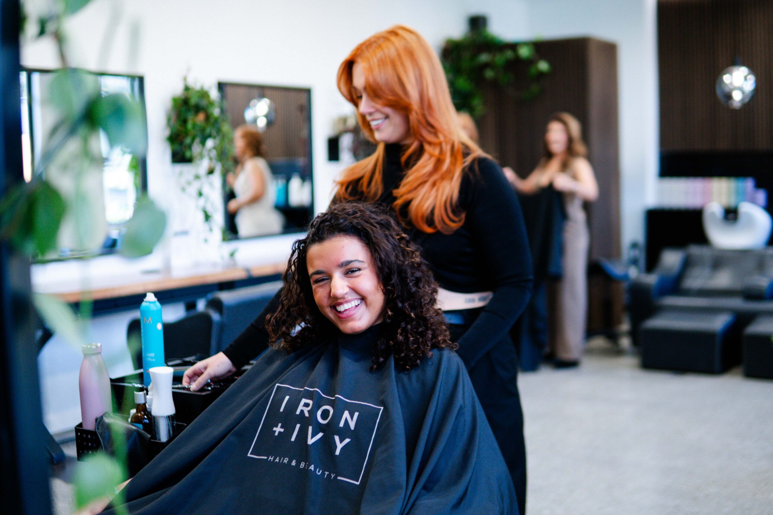 Iron And Ivy Queenstown Curly Hair Client Smiling After Trim 2025.Jpg