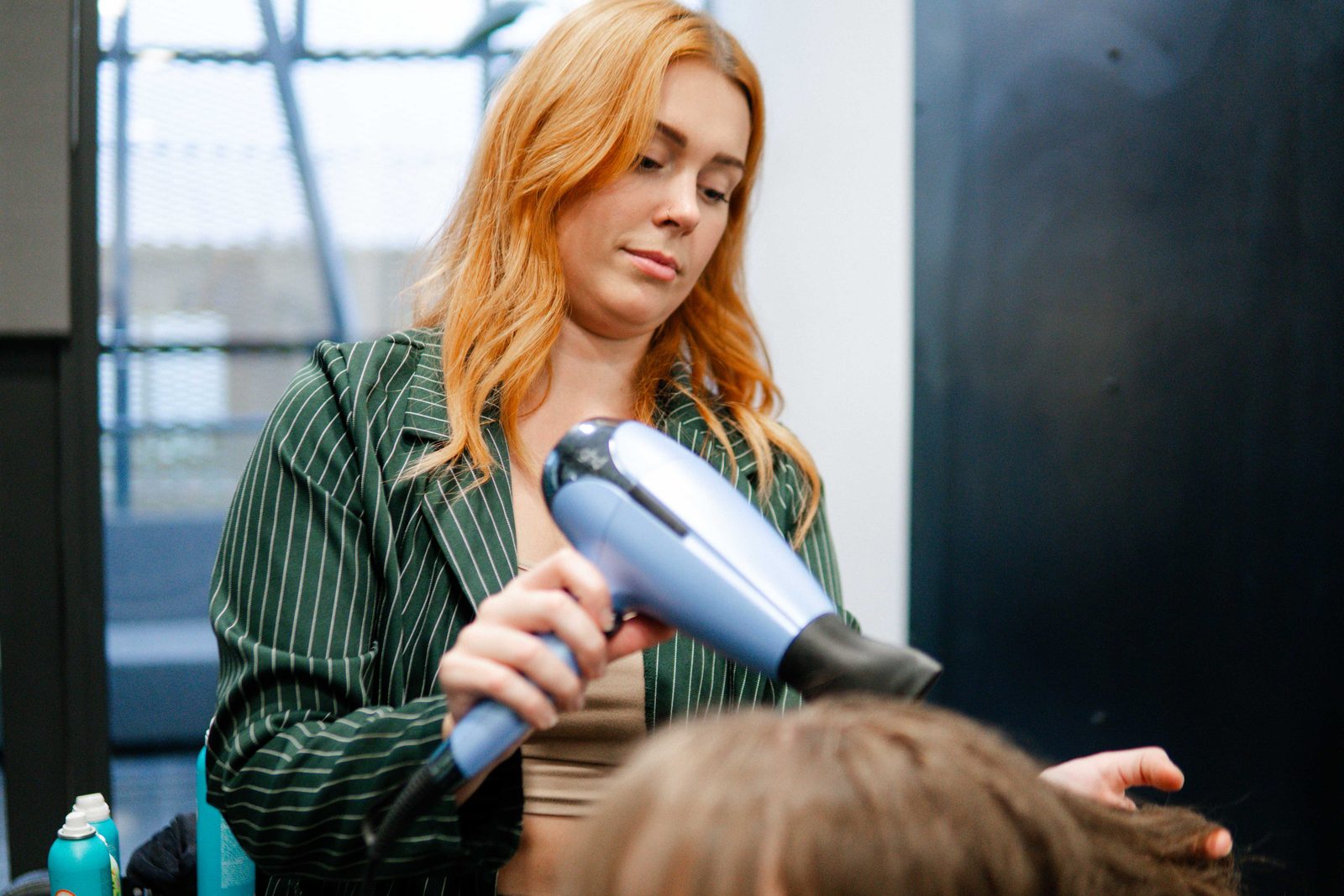 Blow-dry styling service at Iron + Ivy Hair Studio, Queenstown