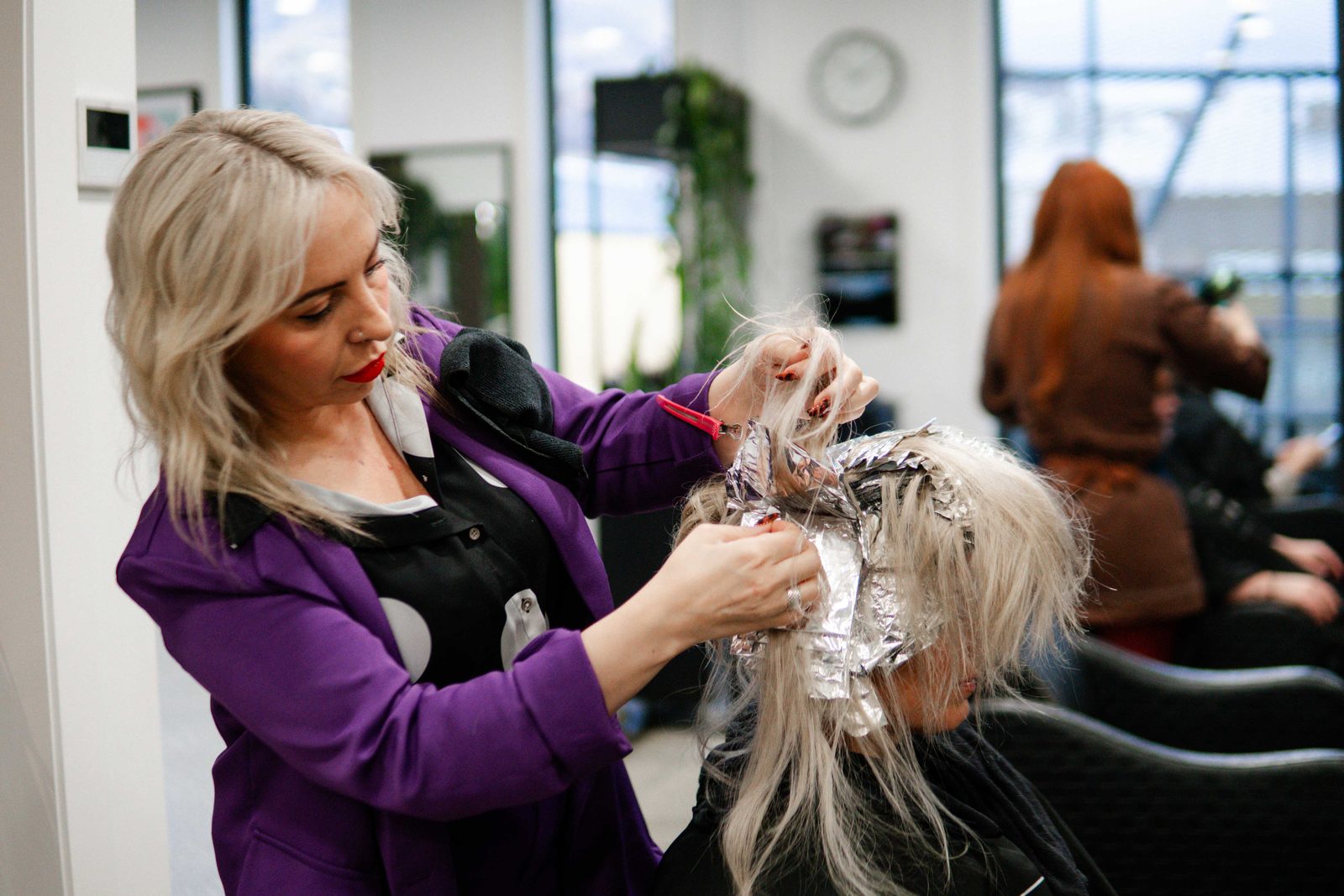 Applying foils for a blonde colour at Iron + Ivy Hair Studio, Queenstown